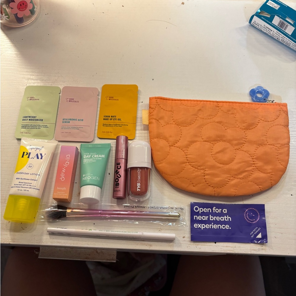 Orange Quilted Cosmetic Pouch with Skincare and Makeup Set (brand new items)